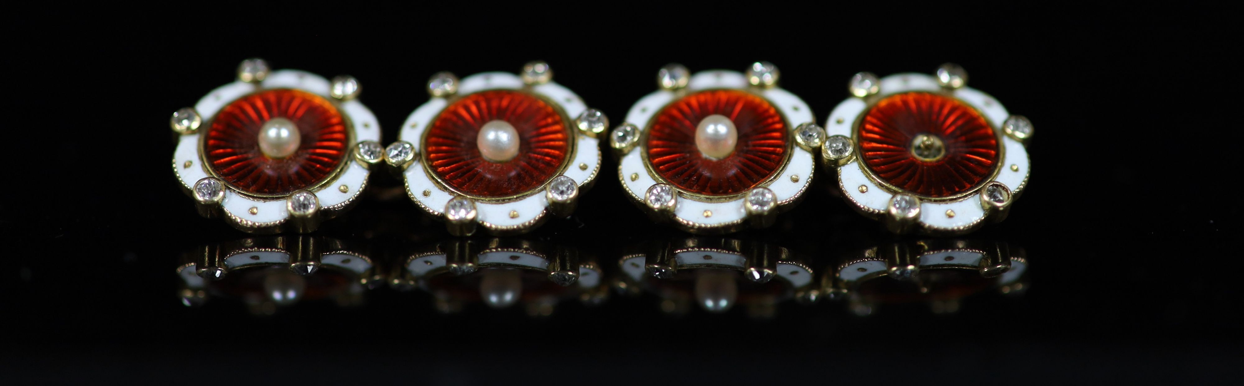 A pair of early 20th century gold, two colour enamel, seed pearl and diamond set cufflinks